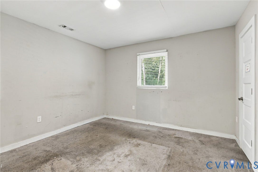 5824 Riverside Drive, Richmond, VA 23225 Recessed ceiling light, single window with blinds, and paneled interior door