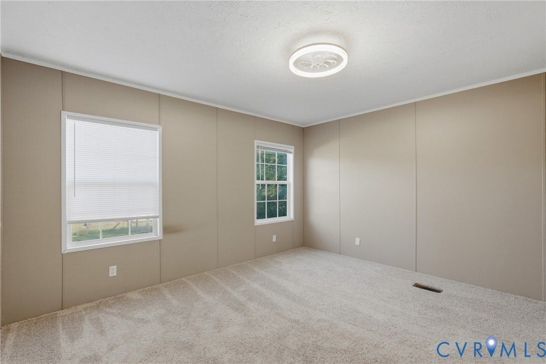 1385 Waltons Store Road, Hadensville North, Louisa, VA 23093 Plush carpet flooring, neutral wall finishes, and a contemporary ceiling light fixture