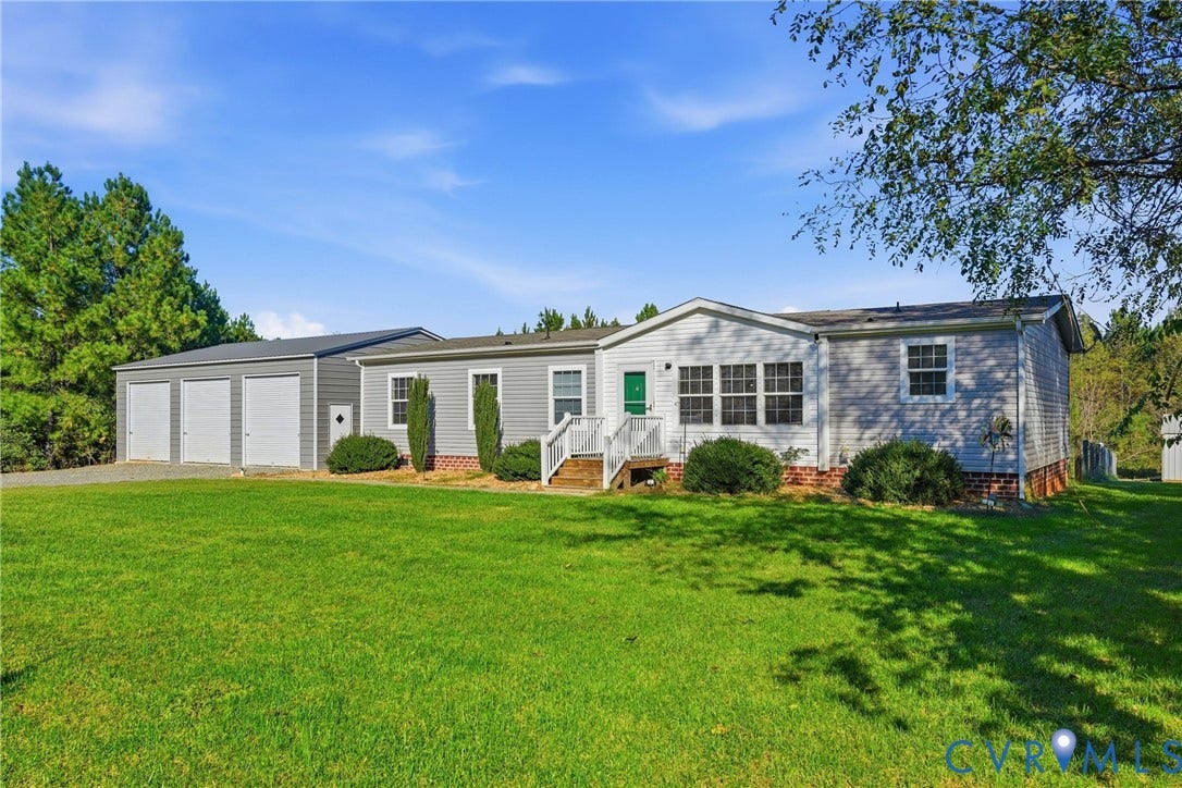1385 Waltons Store Road, Hadensville North, Louisa, VA 23093 Expansive lawn with a detached three-car garage