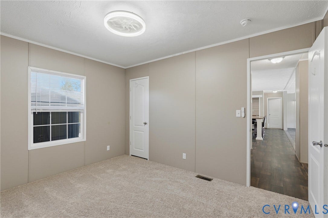 1385 Waltons Store Road, Hadensville North, Louisa, VA 23093 Carpeted flooring, recessed lighting fixture, white trim, and a panel door