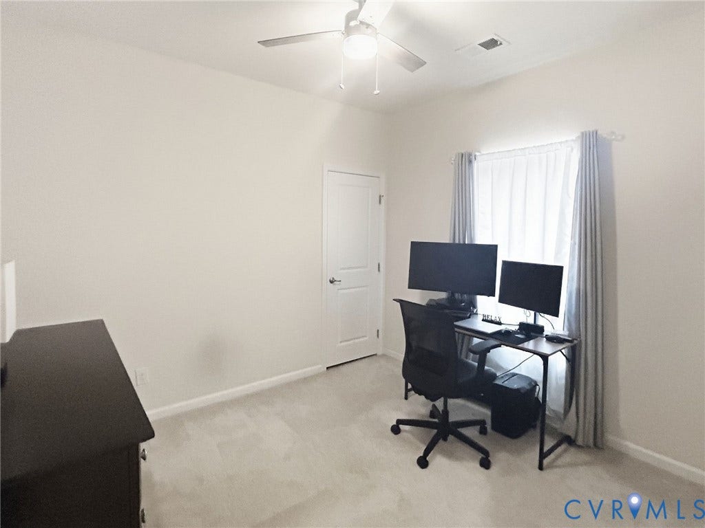 Bedroom 4 Walk In Closet.  Used as Home Office