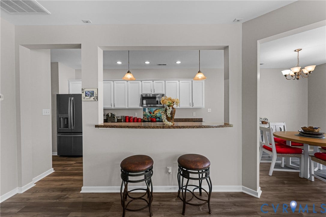 Kitchen pass-through with a stone-finish countertop