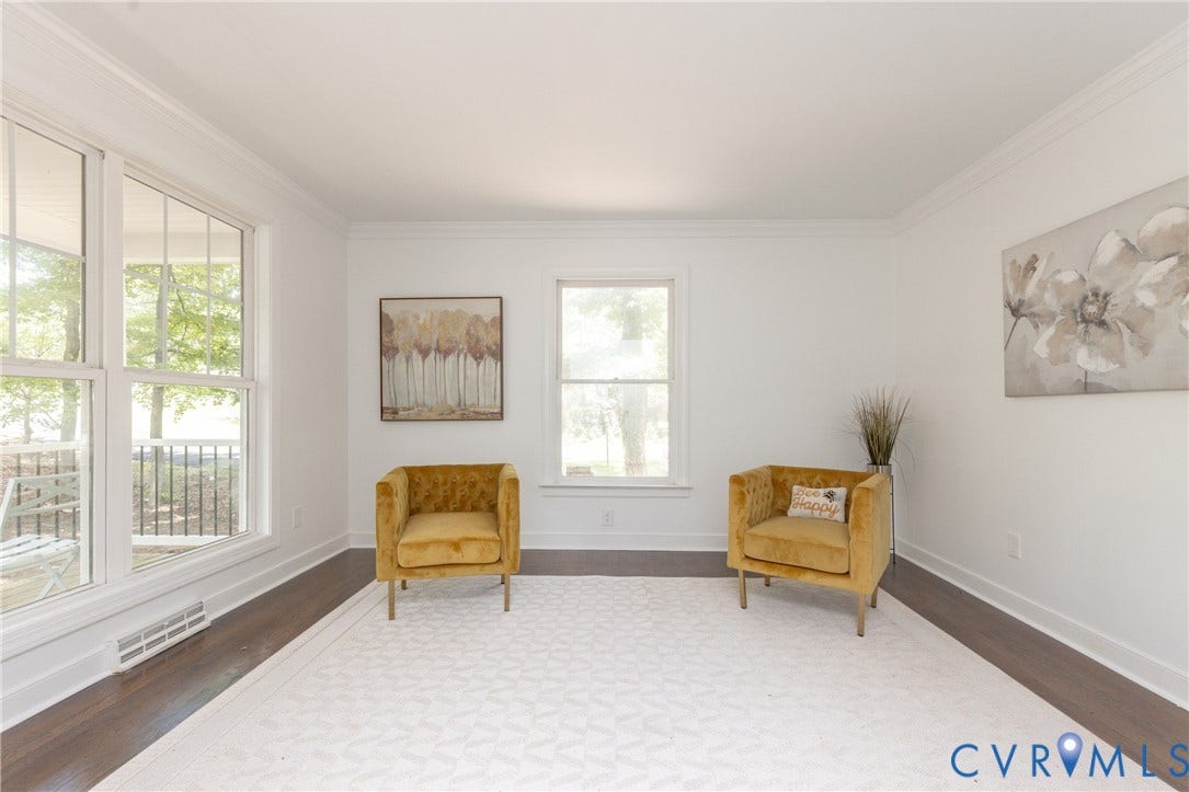 10541 Glencoe Road, Henrico, VA 23060 Crisp white walls, wood-finish flooring, and multiple windows with white trim