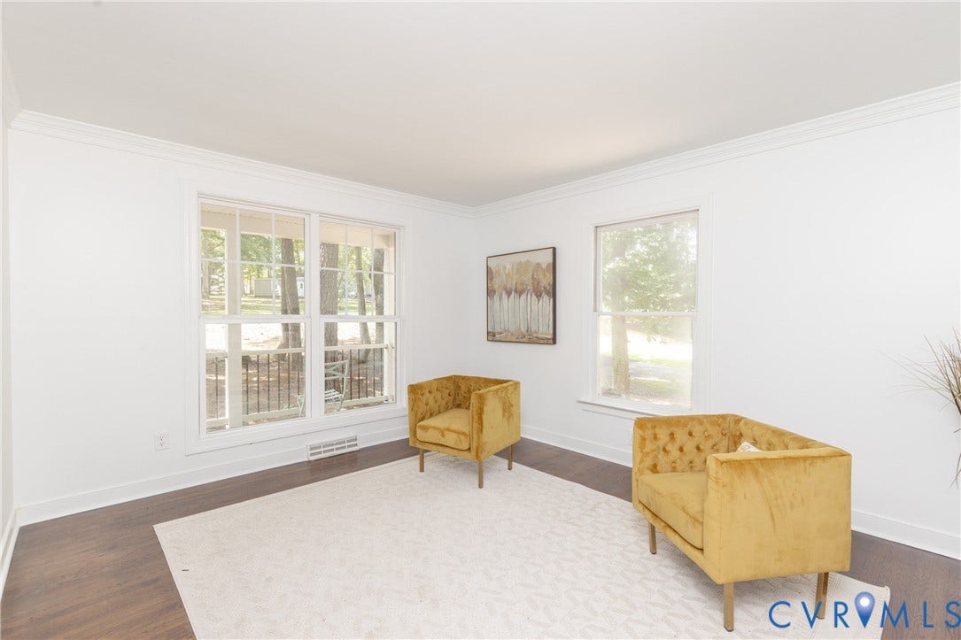 10541 Glencoe Road, Henrico, VA 23060 Hardwood-style flooring, white trim, multiple windows, crown molding, and white walls