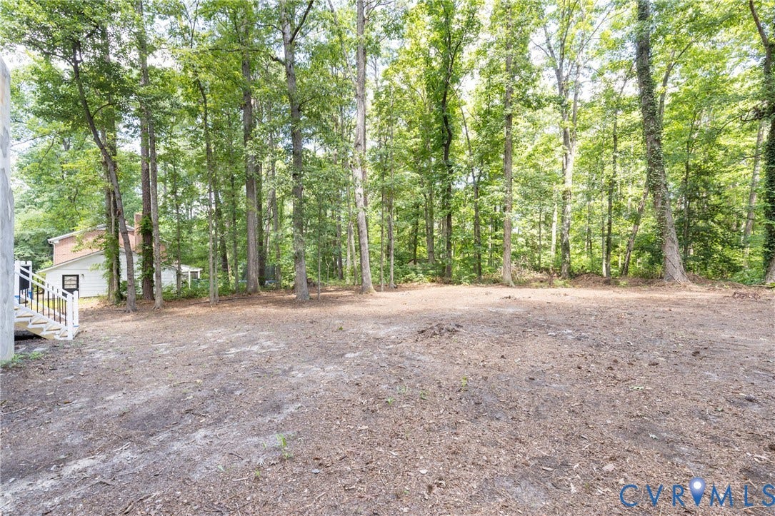 10541 Glencoe Road, Henrico, VA 23060 Wooded lot with mature trees and a sloped terrain