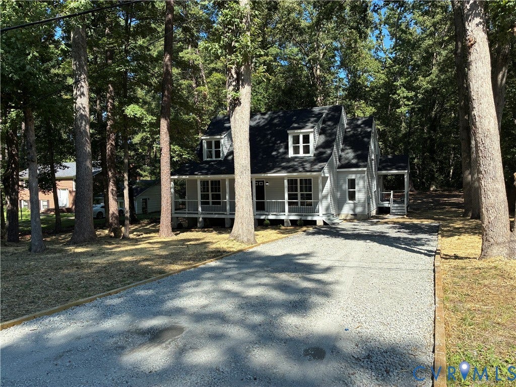 10541 Glencoe Road, Henrico, VA 23060 Light-colored siding exterior with a dark-shingled roof, featuring multiple dormer windows and a covered front porch
