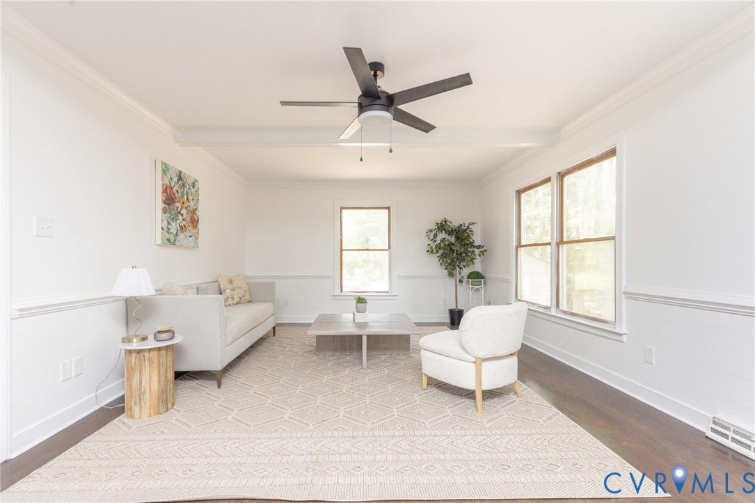 10541 Glencoe Road, Henrico, VA 23060 Spacious room with dark wood-finish flooring, multiple windows, wainscoting, and a ceiling fan