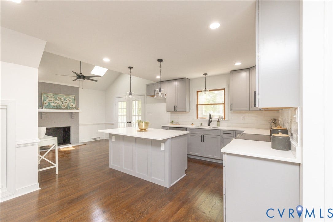 10541 Glencoe Road, Henrico, VA 23060 Kitchen featuring a central island with countertop, shaker-style cabinetry, and pendant lighting