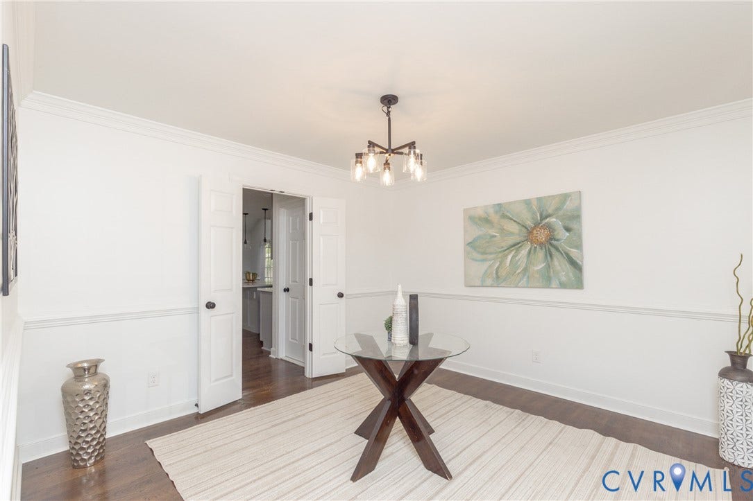 10541 Glencoe Road, Henrico, VA 23060 White paneled walls and dark wood-finish flooring