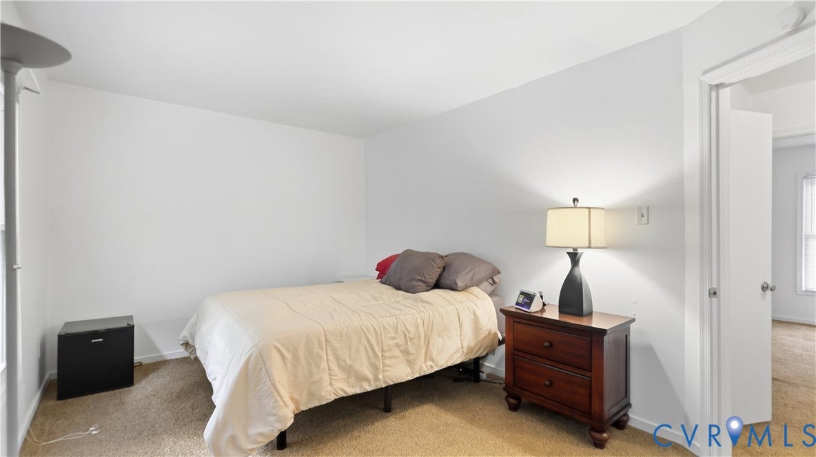 15253 Broadwater Circle, Chester, VA 23831 Carpeted flooring, white painted walls, and white trim