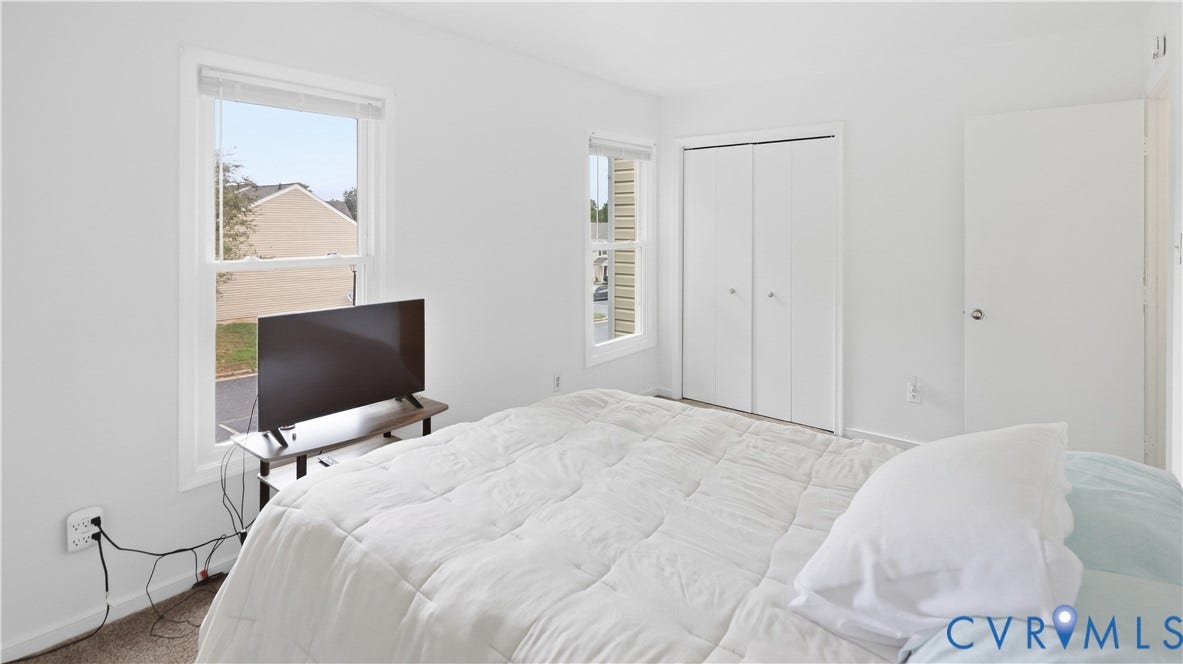 15253 Broadwater Circle, Chester, VA 23831 White walls and trim with a carpeted floor