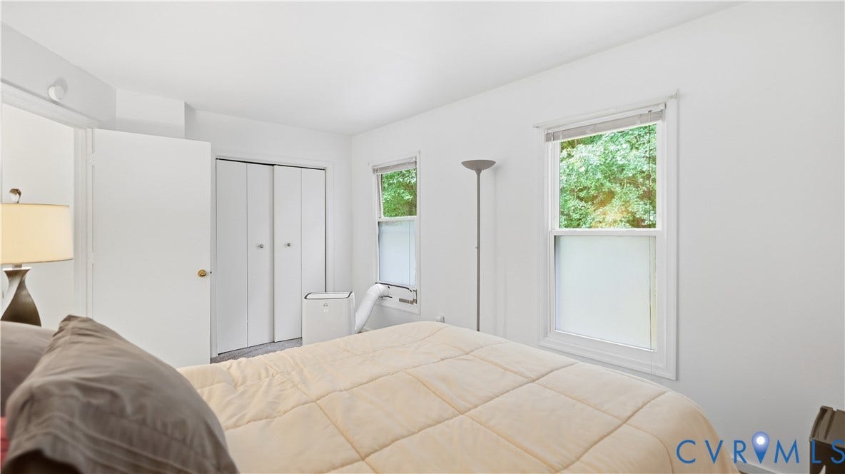 15253 Broadwater Circle, Chester, VA 23831 White walls with two double-hung windows