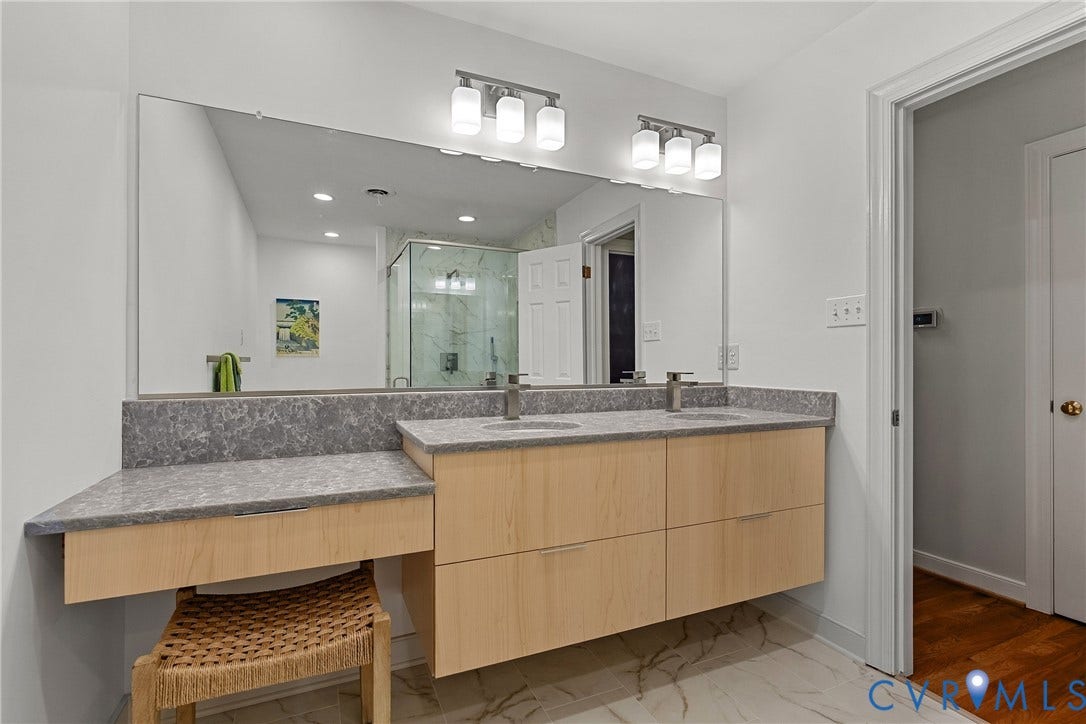 9017 Wood Sorrel Drive, Henrico, VA 23229 Newly renovated primary bath with zero entry shower and custom quartz double vanity