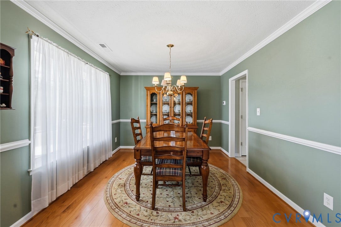 Set the table for holidays, dinner parties, or everyday meals in this inviting formal dining room