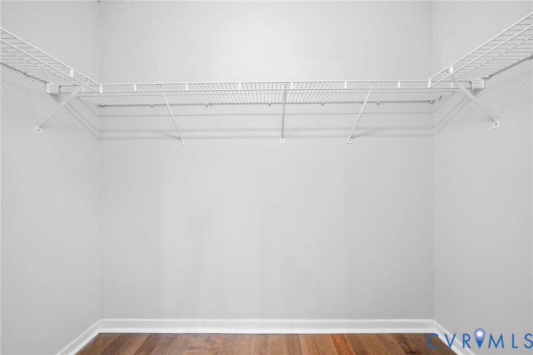 1852 Timberly Waye, Henrico, VA 23238 L-shaped wire shelving system, wire hanging rod, light-toned wall paint, wood-finish flooring, white trim