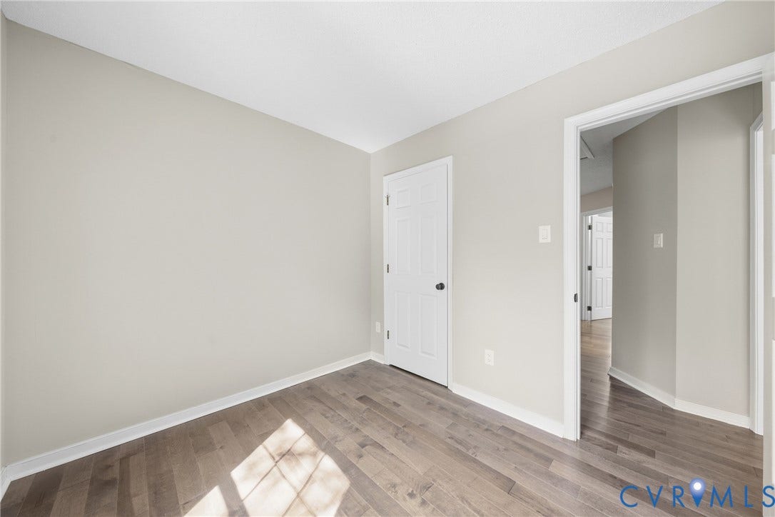 1852 Timberly Waye, Henrico, VA 23238 Wood-finish flooring, neutral wall color, white trim, and white interior doors