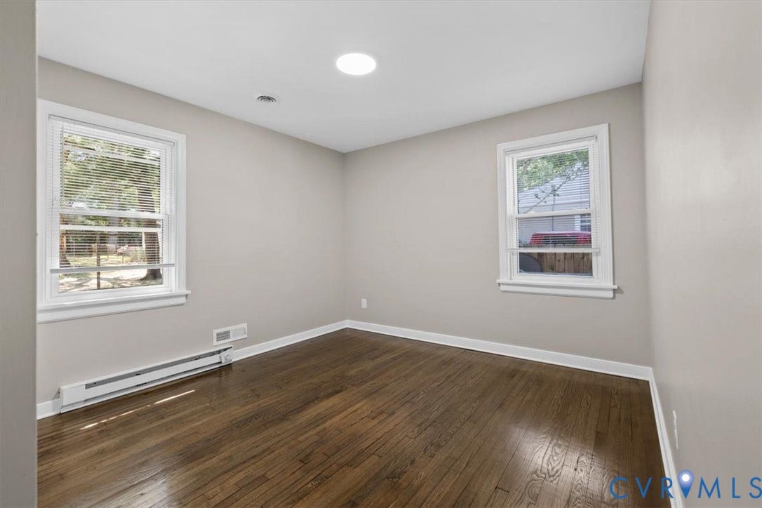 1215 Starling Drive, Henrico, VA 23229 Hardwood flooring, neutral wall tones, white trim, recessed lighting, and multiple windows