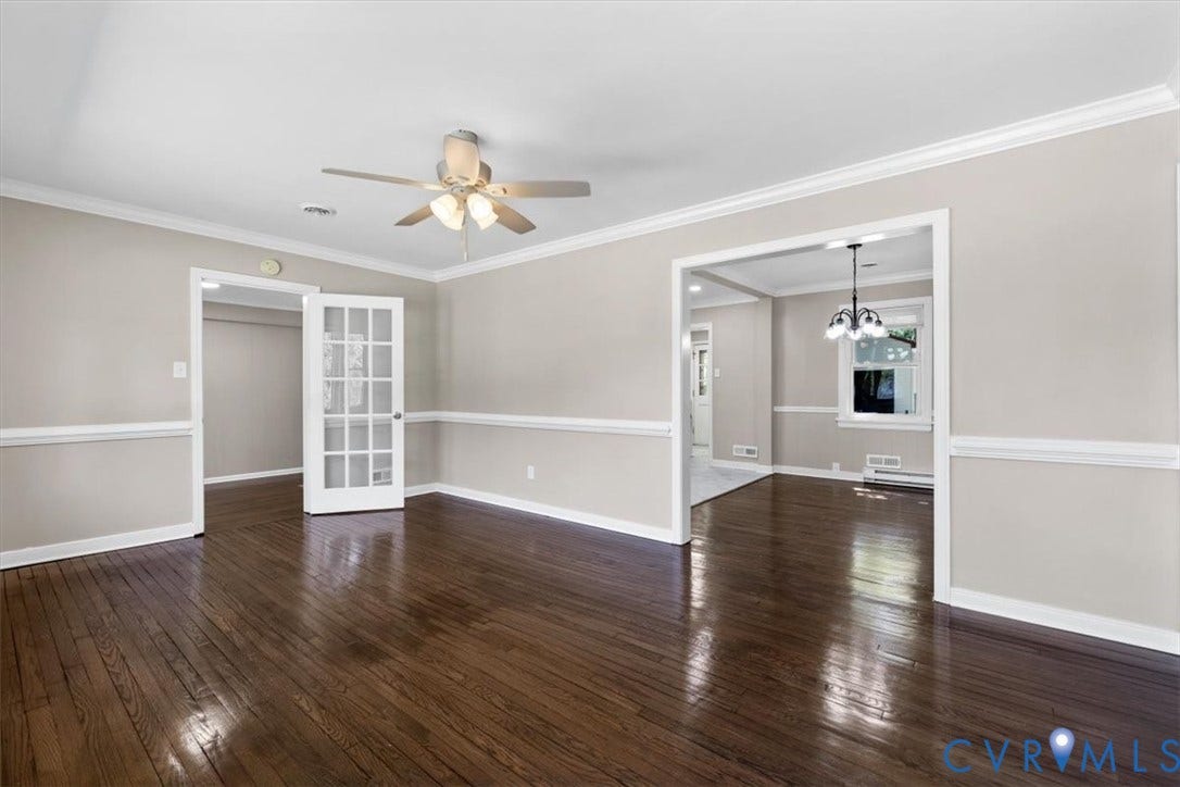 1215 Starling Drive, Henrico, VA 23229 Hardwood flooring, crown molding, chair rail molding, ceiling fan with light fixture, and French doors