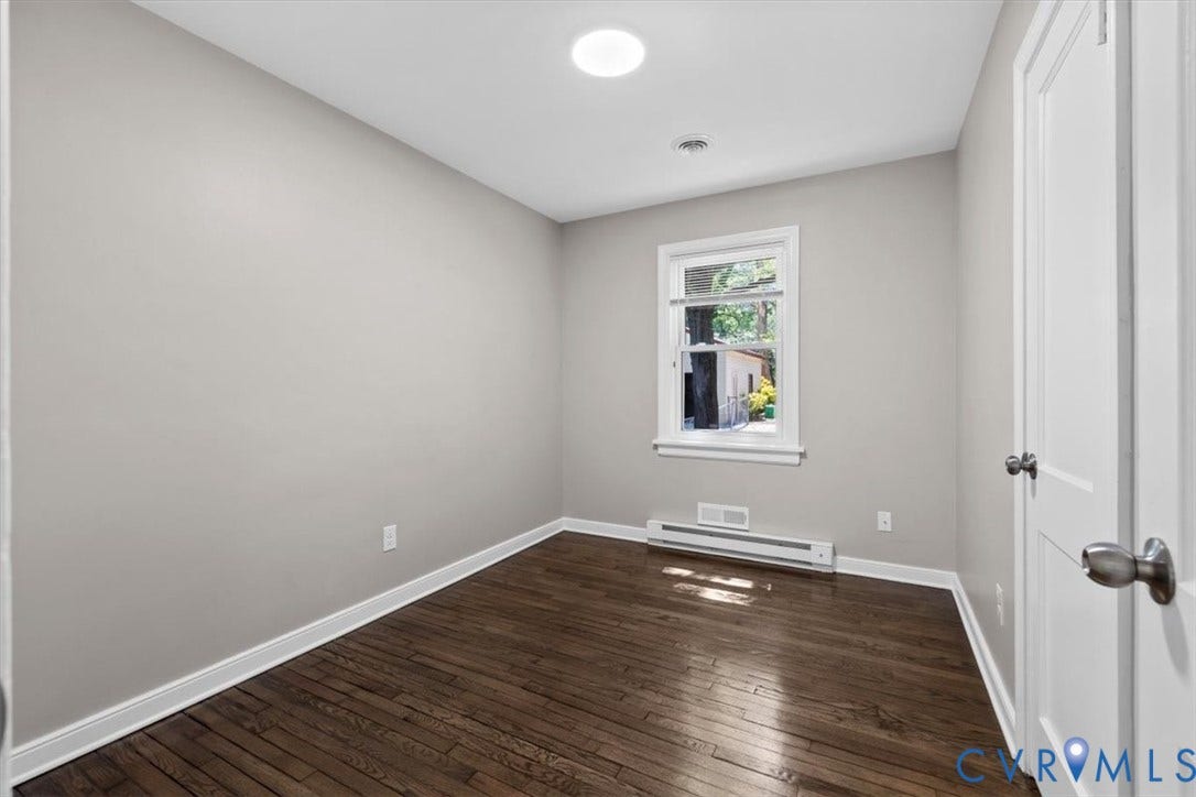 1215 Starling Drive, Henrico, VA 23229 Dark wood-finish flooring, light neutral wall paint, and recessed lighting
