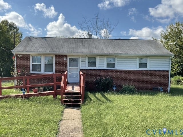 2204 Apollo Road, Fairfield, Fairfield, VA 23223 Brick and siding exterior with a red ramp, concrete walkway, and a gray shingle roof
