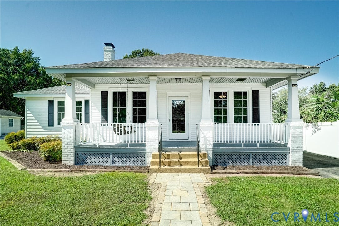 10024 Washington Road, Richmond, VA 23060 White siding exterior with a covered front porch featuring white columns