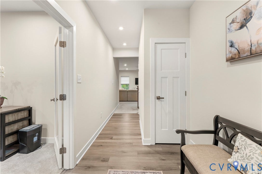 4837 Bacova Village Trail, Glen Allen, VA 23059 Recessed lighting, light-toned wall paint, wood-finish flooring, white interior doors, and a glass-paneled interior door
