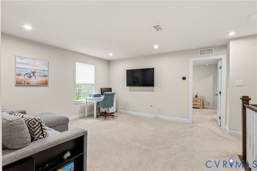 4837 Bacova Village Trail, Glen Allen, VA 23059 Recessed ceiling lighting, neutral-toned carpeting, white trim, and a window with a roller shade