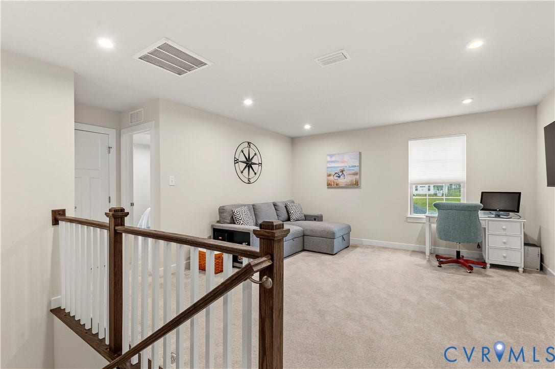 4837 Bacova Village Trail, Glen Allen, VA 23059 Carpeted area featuring recessed lighting, a single window, and a wood and white baluster railing