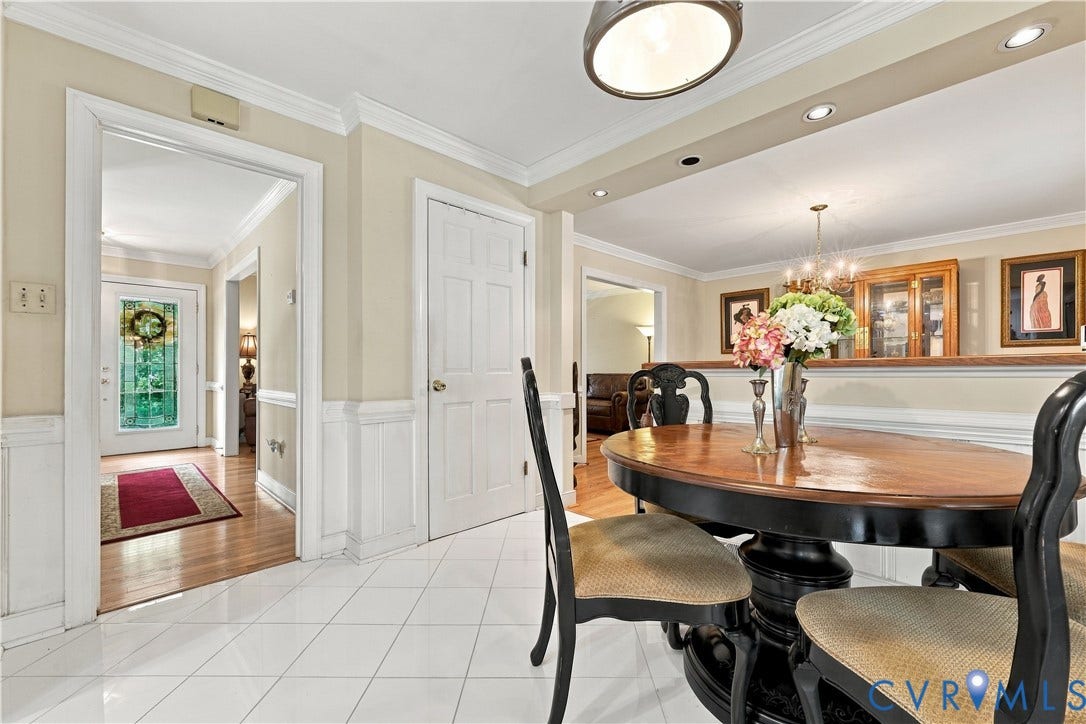 8307 Wallingford Lane, Chickahominy Bluffs, Henrico, VA 23227 White ceramic tile flooring, recessed lighting, crown molding, chair rail molding, and a paneled white door