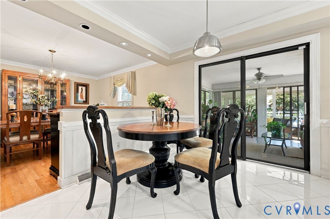 8307 Wallingford Lane, Chickahominy Bluffs, Henrico, VA 23227 White tile flooring, wainscoting, crown molding, sliding glass doors, and recessed lighting