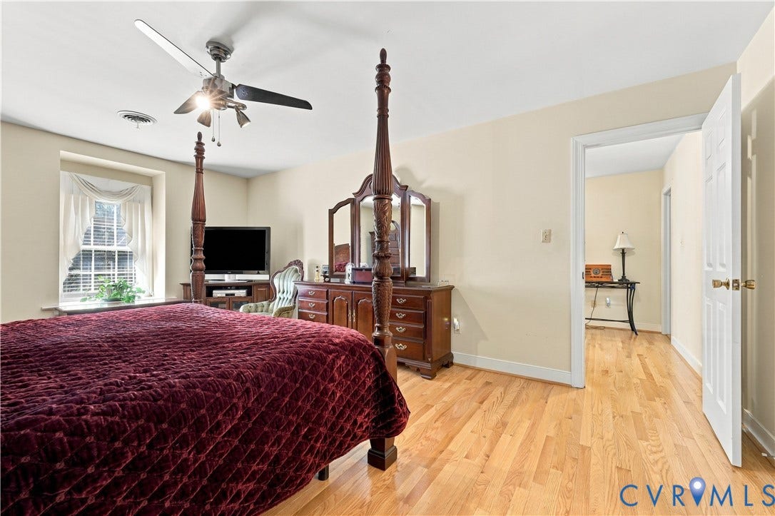 8307 Wallingford Lane, Chickahominy Bluffs, Henrico, VA 23227 Hardwood flooring, painted walls, and a ceiling fan with integrated lighting