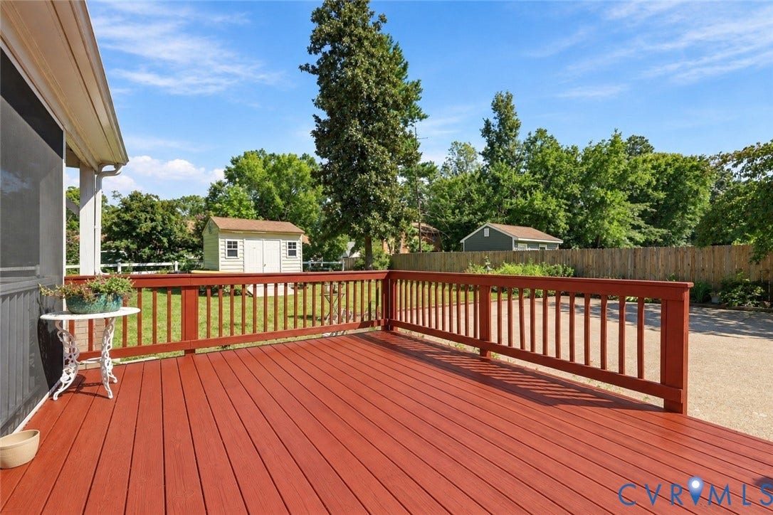 8307 Wallingford Lane, Chickahominy Bluffs, Henrico, VA 23227 Expansive deck with red wood-finish flooring and matching railing
