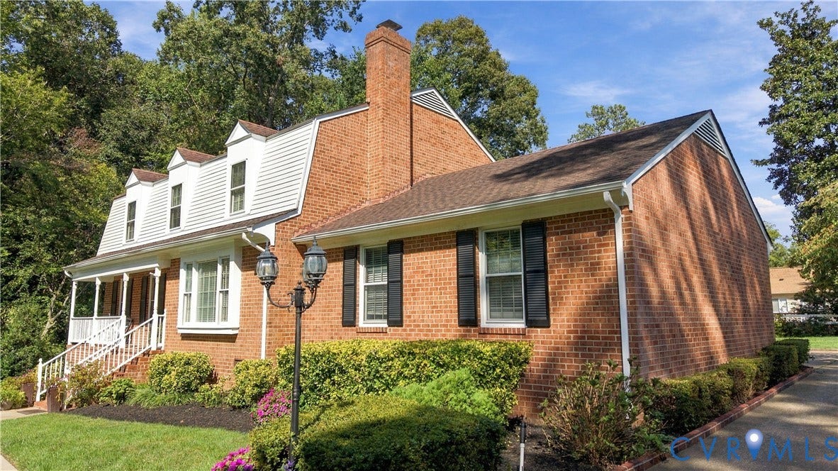 8307 Wallingford Lane, Chickahominy Bluffs, Henrico, VA 23227 Brick exterior with white siding accents and a contrasting roof