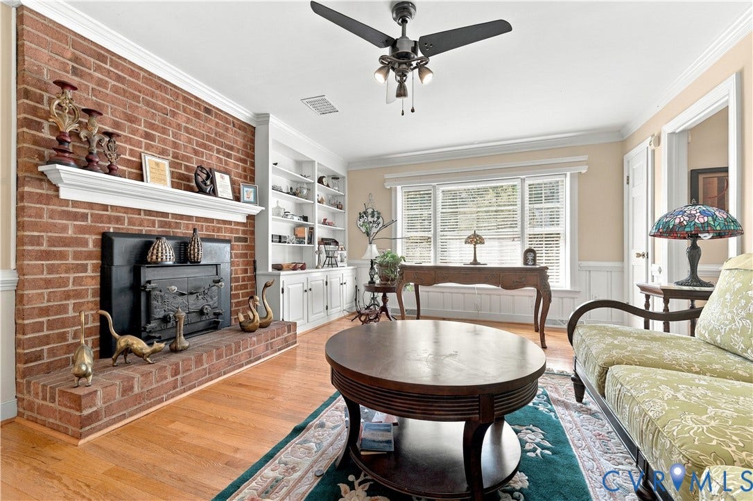 8307 Wallingford Lane, Chickahominy Bluffs, Henrico, VA 23227 Brick fireplace with a substantial hearth and white mantel