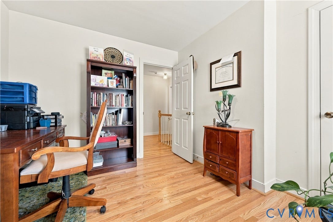 8307 Wallingford Lane, Chickahominy Bluffs, Henrico, VA 23227 Light hardwood flooring, crisp white walls, and a multi-paneled interior door