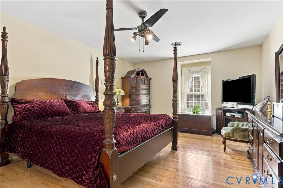 8307 Wallingford Lane, Chickahominy Bluffs, Henrico, VA 23227 Wood-finish flooring, ceiling fan with integrated lighting, natural light from the window, and neutral wall tones