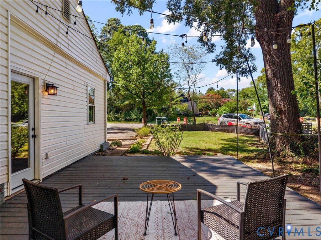 5112 Bethlehem Road, Libbie Mill Area, Richmond, VA 23230 Expansive outdoor deck with string lighting and a mature tree