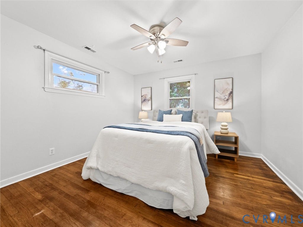 5112 Bethlehem Road, Libbie Mill Area, Richmond, VA 23230 Hardwood flooring, painted white walls, recessed window, and a ceiling fan with integrated lighting