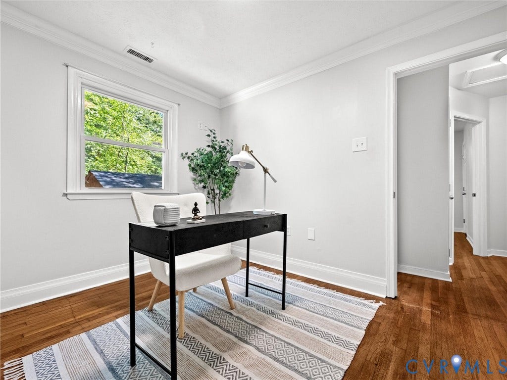 5112 Bethlehem Road, Libbie Mill Area, Richmond, VA 23230 Hardwood flooring throughout, bright window with exterior scenery, crown molding, and a wide entryway