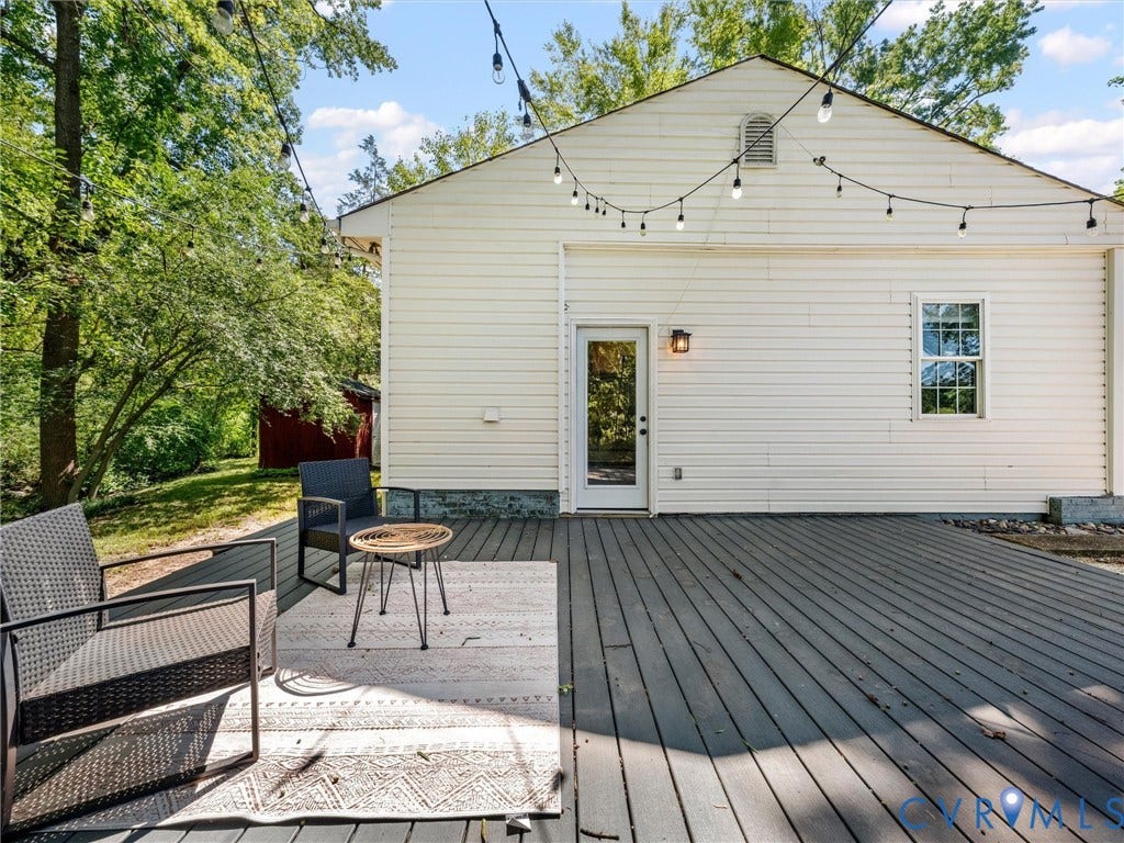 5112 Bethlehem Road, Libbie Mill Area, Richmond, VA 23230 Expansive wood-finish deck with direct access to interior via a glass-paneled door