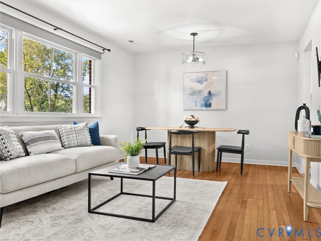5112 Bethlehem Road, Libbie Mill Area, Richmond, VA 23230 Hardwood flooring throughout, multiple large windows, and a contemporary ceiling light fixture