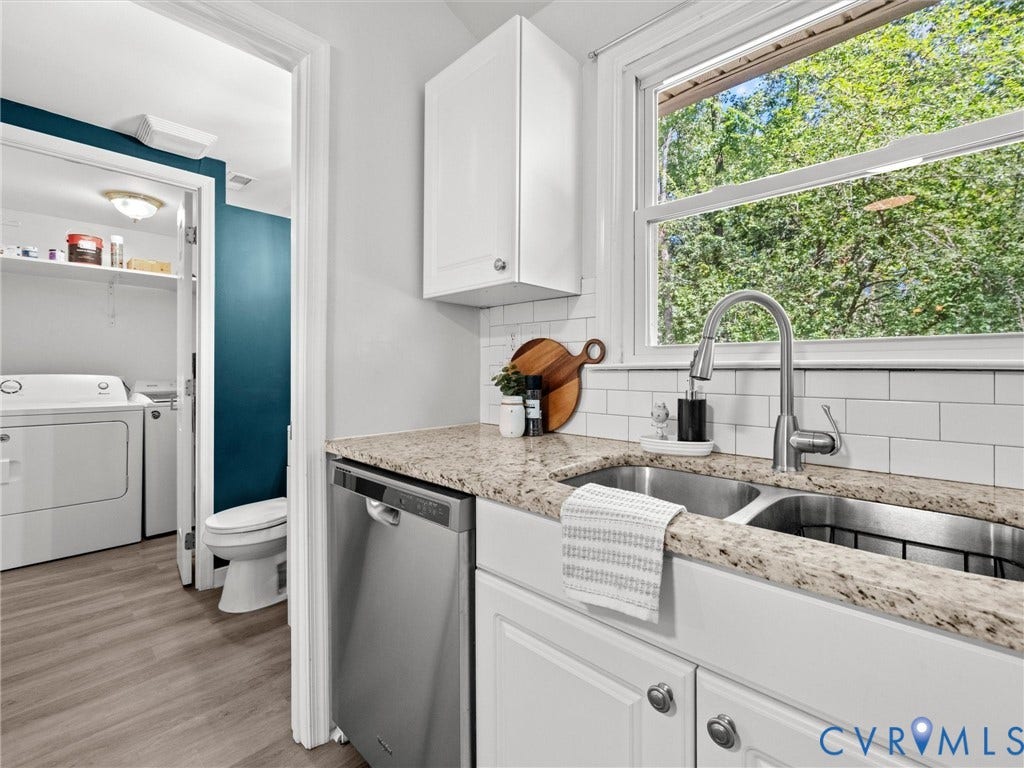 5112 Bethlehem Road, Libbie Mill Area, Richmond, VA 23230 Kitchen featuring granite-style countertops, white cabinetry, a stainless steel dishwasher, and a double basin sink with a gooseneck faucet