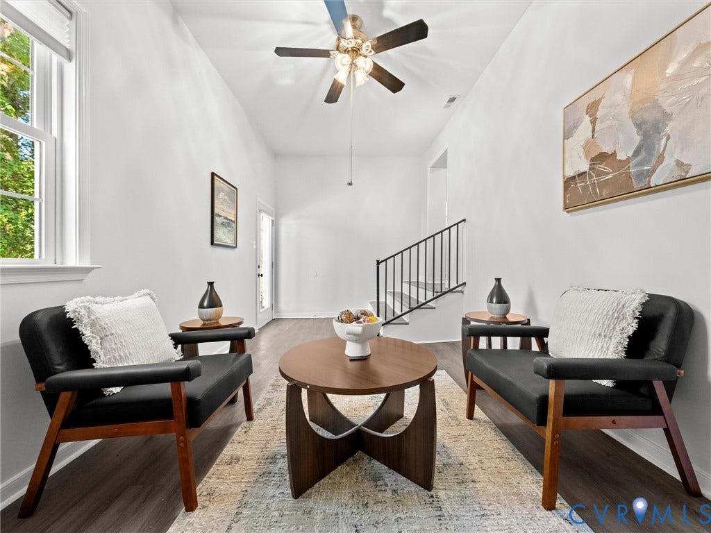 5112 Bethlehem Road, Libbie Mill Area, Richmond, VA 23230 Vaulted ceiling with a ceiling fan, dark wood-finish flooring, white walls, and a staircase with black railings