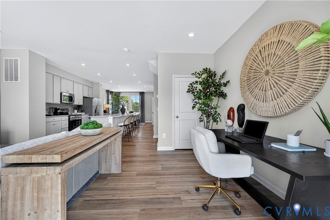 6126 Hull Street Road, Richmond, VA 23224 Open concept living with wood-finish flooring, recessed lighting, and a dedicated workspace