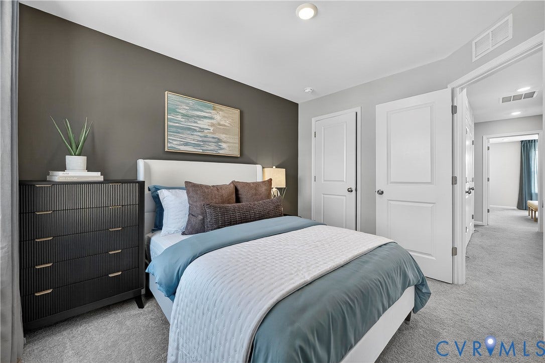 6126 Hull Street Road, Richmond, VA 23224 Recessed ceiling lighting, durable carpeting, two-panel interior doors, and a neutral color palette create a versatile space
