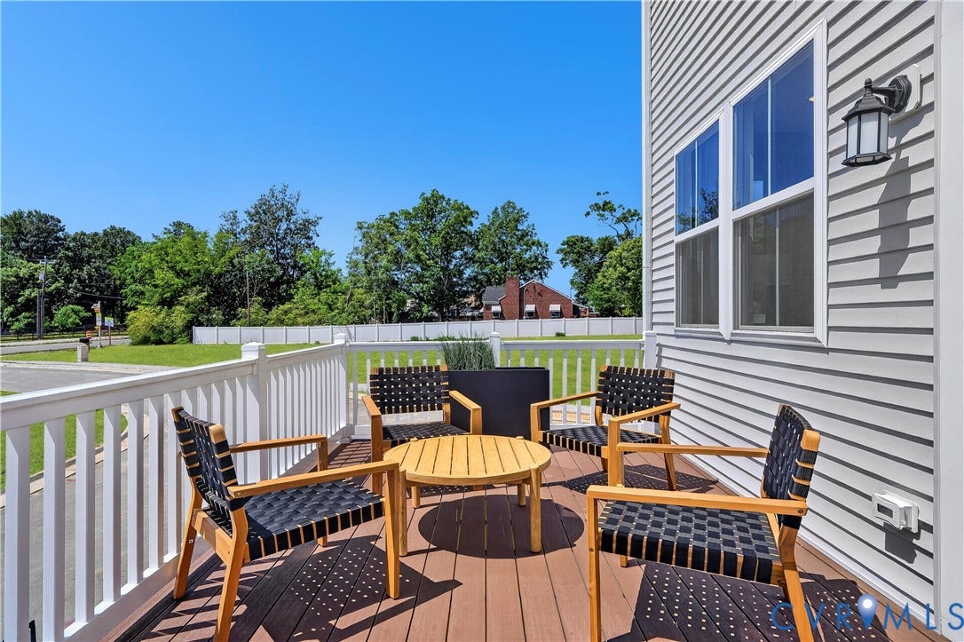 6126 Hull Street Road, Richmond, VA 23224 Outdoor deck featuring wood-finish flooring and white railing