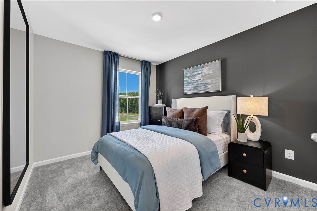 6126 Hull Street Road, Richmond, VA 23224 Recessed ceiling lighting, carpeted flooring, and a single window with curtain rods
