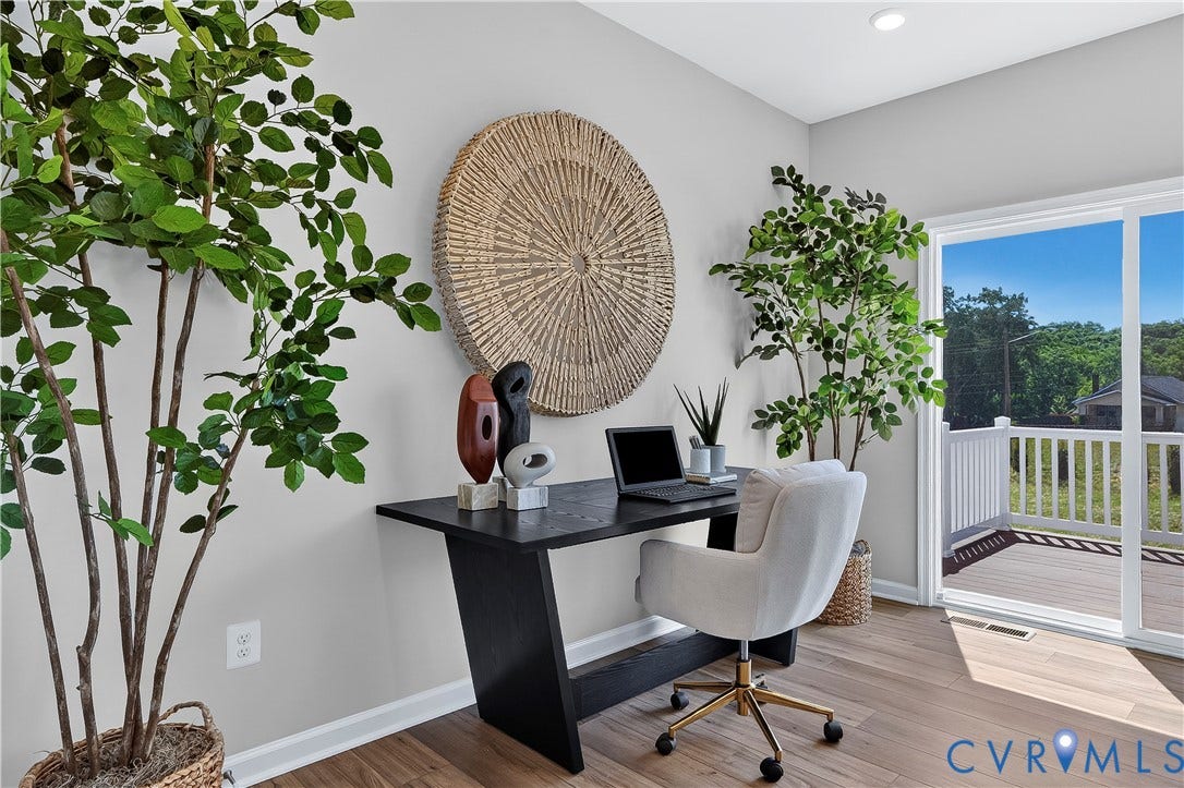 6126 Hull Street Road, Richmond, VA 23224 Wood-finish flooring, sliding glass door, recessed lighting, and light gray wall paint