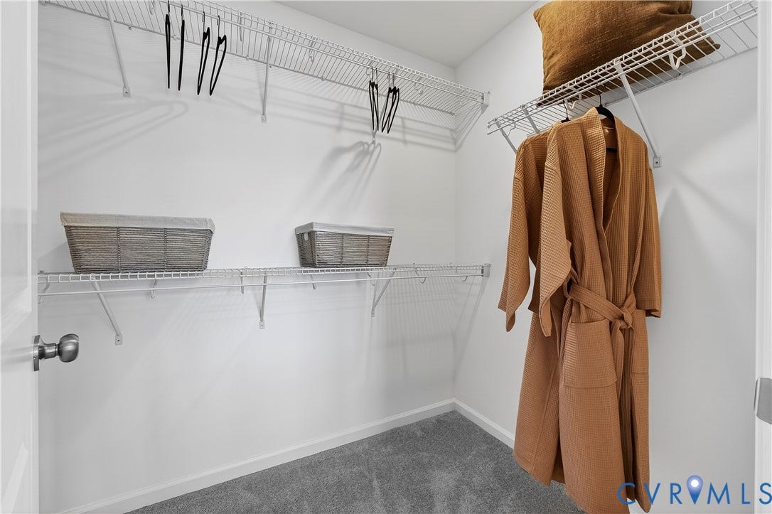 6126 Hull Street Road, Richmond, VA 23224 White wire shelving system, durable gray carpeting, and neutral paint finishes