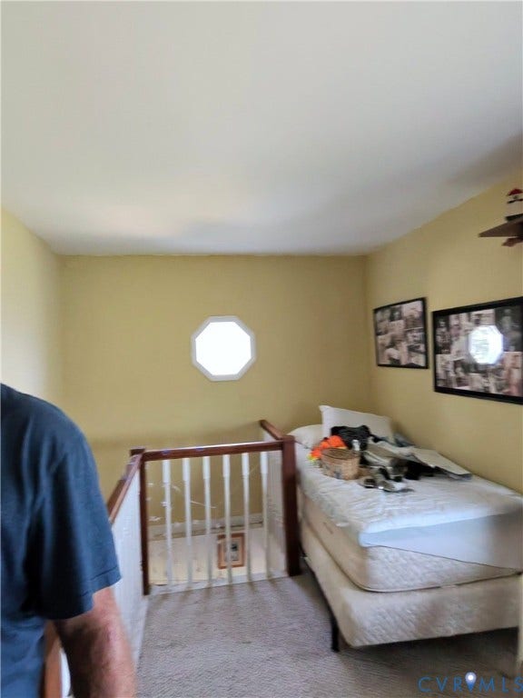 36 Beach Road, Reedville, VA 22539 Octagonal window accenting the upper landing